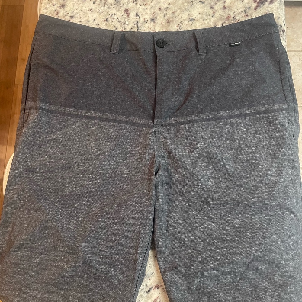 Travis Matthew’s grey golf shorts. Size 36